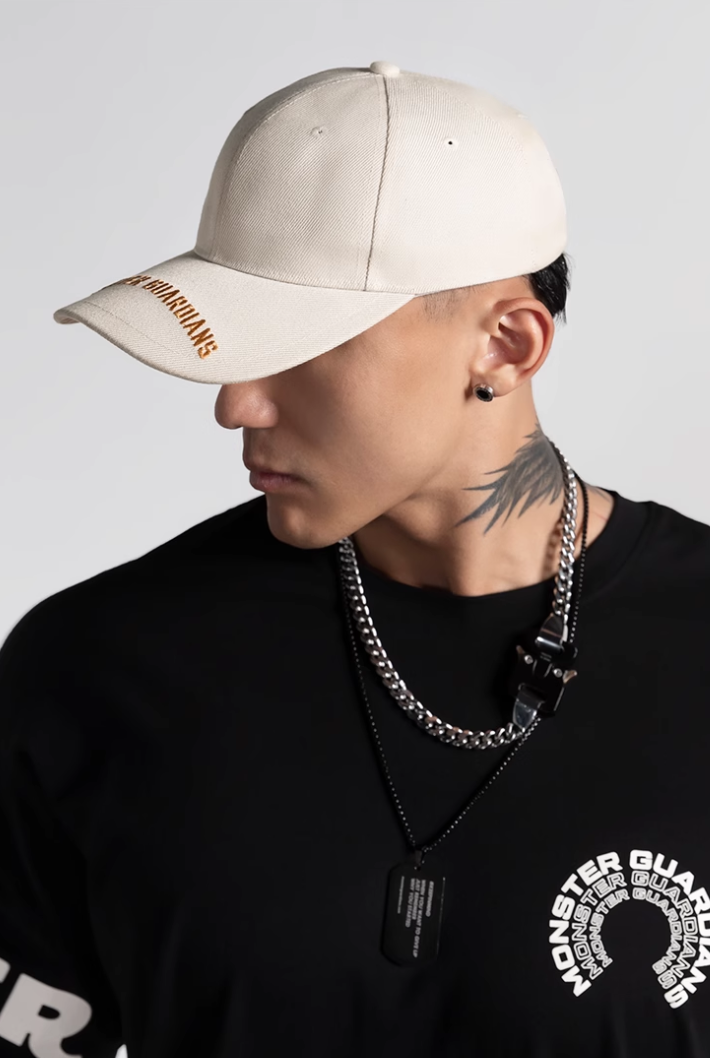Embroidered logo curved brim cap