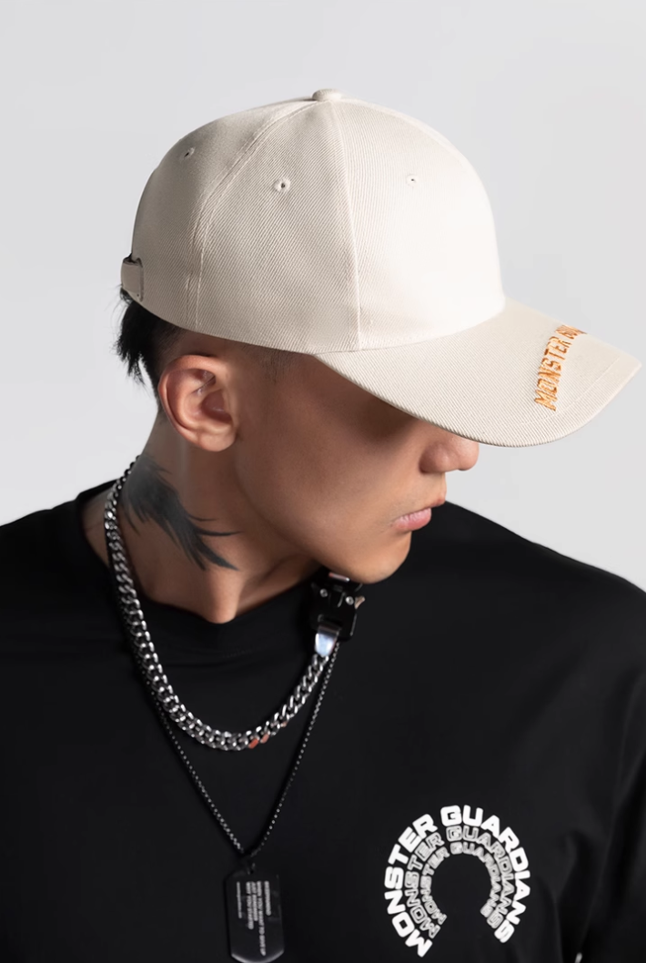 Embroidered logo curved brim cap